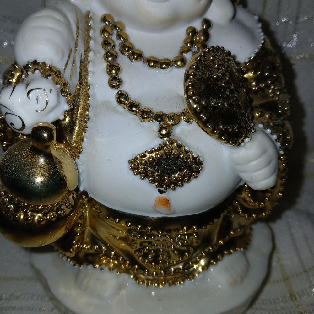 Gold and White Buddha Figurine